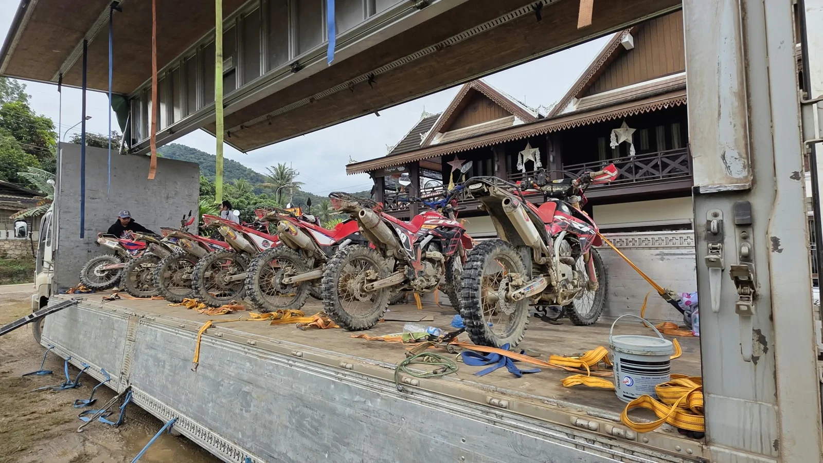 Motorcycles parked outside accommodation.