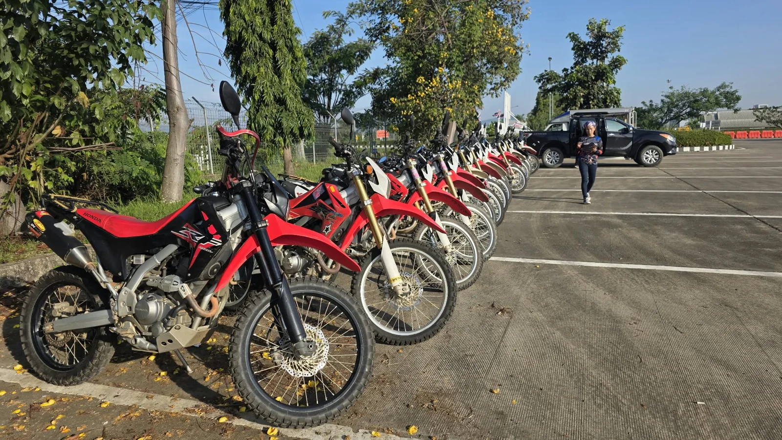 A line-up of Honda dirt bikes before the next stage.