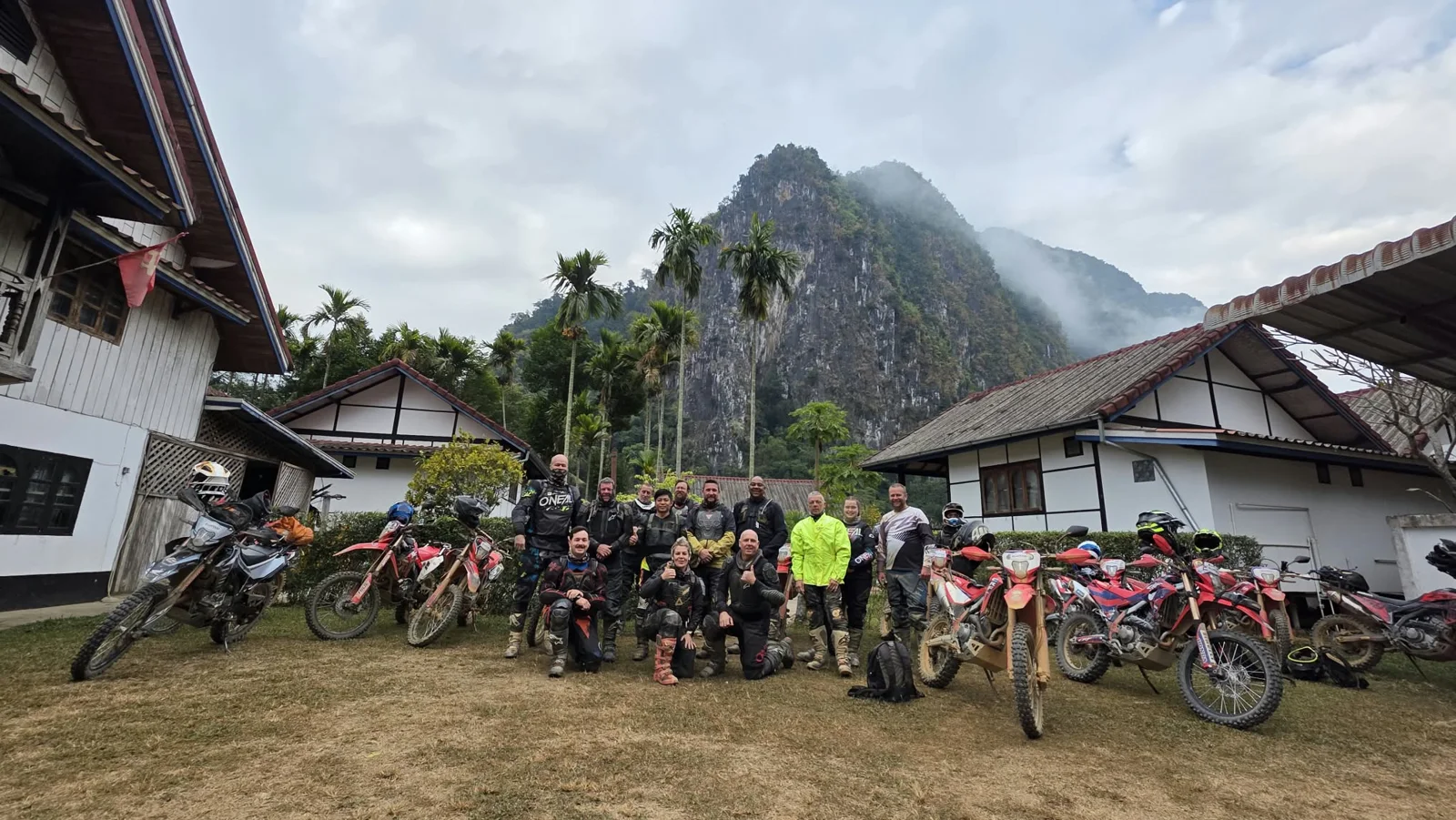 Riders gathering at a village stop.