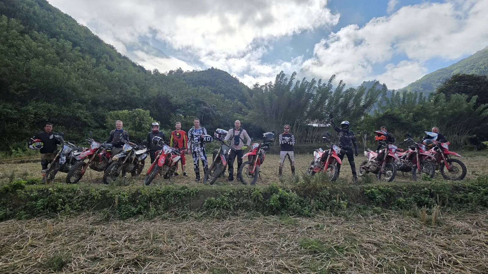 The group together in a mountain village.